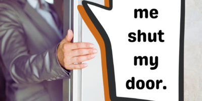 Healthcare executive behind an open door